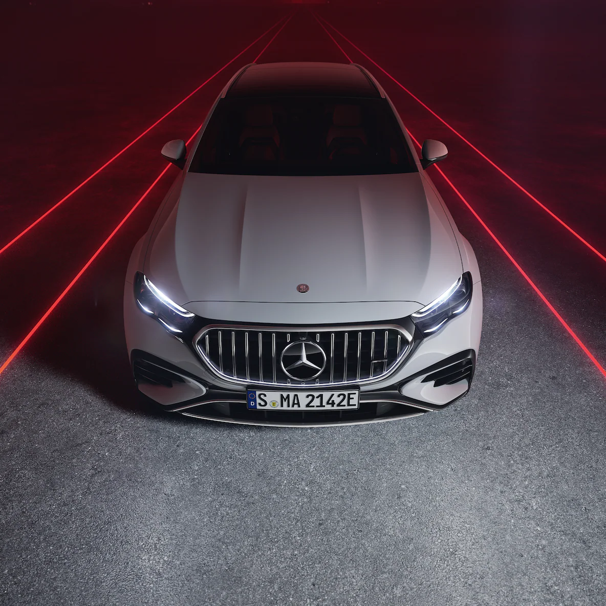 Mercedes-AMG framed by red light streaks