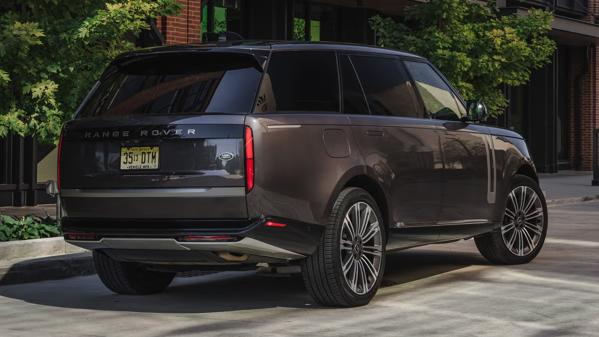 Range Rover parked on a tree-lined street